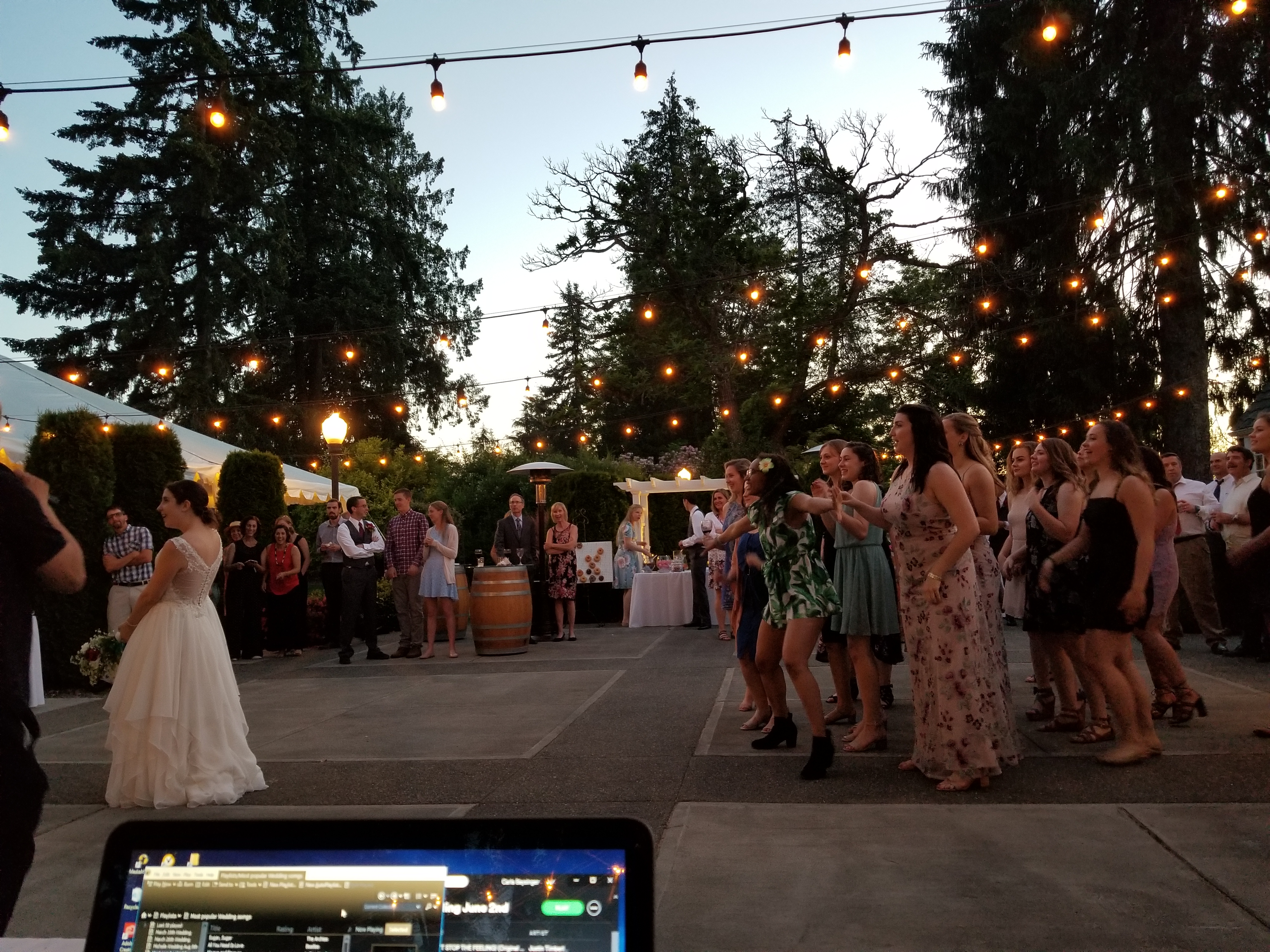 Bouquet Toss with laptop at the bottom