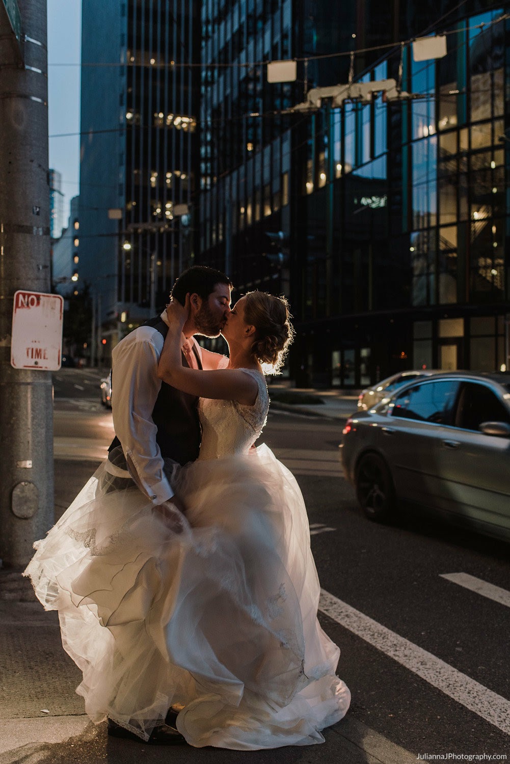 Couple kissing in street