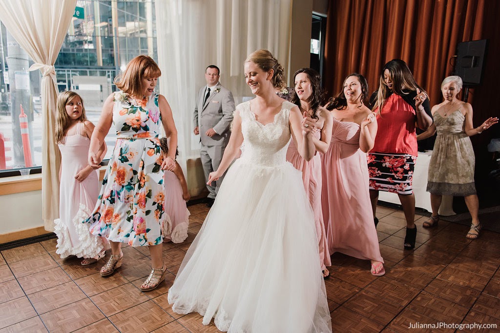 Bride dancing with guests